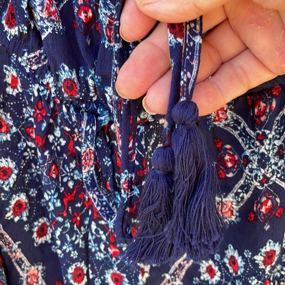 A Rewind Woman’s NWT Romper Size Xl Blue Red Floral with Pom Pom trim on hem - Picture 4 of 9